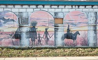                         Portion of a fading mural on an old building in Spearfish, a city of about 11,000 population (as of 2020) near the Wyoming border in far-western South Dakota that supplied many of the foodstuffs to the thriving mining camps in the nearby Black Hills in the early 1900s                        