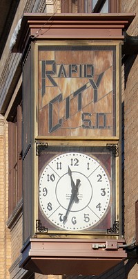                         A vintage street clock in Rapid City, the principal metropolis in far-western South Dakota, within that state's within that state's portion of the Black Hills range                        