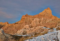                         Late-December view of western South Dakota's Badlands National Park, southeast of Rapid City, when the region's stark rock formations get dustings of snow such as these and also dangerous full-scale blizzards                        