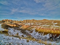                         Late-December view of western South Dakota's Badlands National Park, southeast of Rapid City, when the region's stark rock formations get dustings of snow such as these and also dangerous full-scale blizzards                        