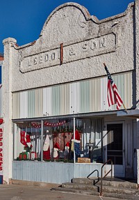                         Christmas decorations adorn this old building, now (as of 2021) a hair salon in the village of Gordon in northwest Nebraska                        