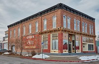                         Vintage brick building with an old advertisement for Japanese cars in Chadron, a small city but the largest in the northwest corner of Nebraska, south of South Dakota and east of Wyoming                        