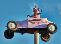                         One of several imaginative cartoon-style car creations in the Fred's Flying Circus display outside the G.I. Body and Glass shop in Grand Island, Nebraska                        