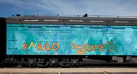                         The "North of Normal" promotional slogan for the adjoining cities of Fargo, North Dakota, and Moorhead, Minnesota, painted on a train car parked at the Northern Pacific Railroad Depot in Fargo                        