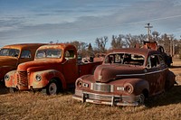                         Three of what the Hotrodgarage.net business calls "project vehicles," meaning old ones needing lots of work, are for sale in a large lot outside Burlington, North Dakota                        