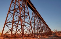                         A portion of the Burlington Northern Railway's abandoned Gassman Coulee Trestle outside Minot (pronounced MINE-ott), the principal city in north-central North Dakota whose metropolitan are sprawls across three counties                        