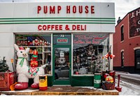                         An old Sinclair gas station, converted into a collectibles store and deli in Deadwood, a legendary Wild West-era town in the Black Hills of western South Dakota                        