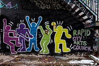                         A portion of the Art Alley, a site for impromptu drawings in an alley between two main downtown streets in Rapid City, the principal metropolis in far-western South Dakota, within that state's portion of the Black Hills range                        