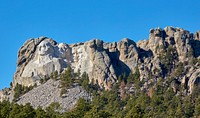                         View of the Mount Rushmore National Memorial, one of the United States' most famous and beloved sculptures, high in the Black Hills of southwestern South Dakota near the tiny town of Keystone                        