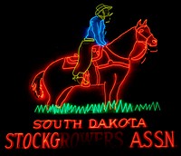                         Neon sign touting the South Dakota Stockgrowers' Association (minus the malfunctioning "growers" portion), in Rapid City                        