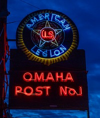                         Dusk shot of the neon sign outside the American Legion Post 1, the first post of the veterans' organization chartered in Nebraska, in Omaha, the state's largest city                        