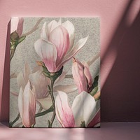 Magnolia flower canvas leaning against a wall