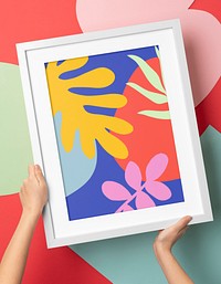 Photo frame mockup, hands decorating wall psd