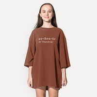 Casual tshirt dress mockup, simple brown apparel design worn by a young woman psd