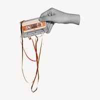 Hand holding ruined cassette tape