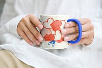 Coffee mug mockup, cute heart doodle design psd