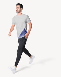 Sporty man walking in t-shirt and sweatpants, full body