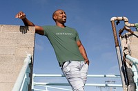 Casual tshirt mockup, editable psd worn by confident African American man