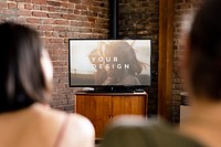 Couple watching a movie on a tv screen mockup