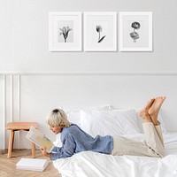Woman reading in her bedroom