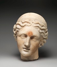 Marble head of a goddess wearing a diadem