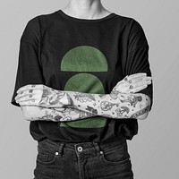 Cool tattooed woman in genderless fashion