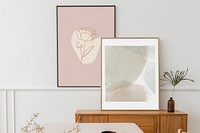 Picture frame mockups over a wooden sideboard table