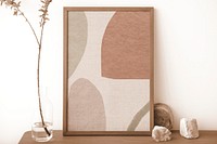 Picture frame mockup psd with abstract earth tone image