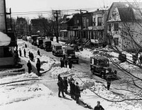 Photograph of mail trucks on parade