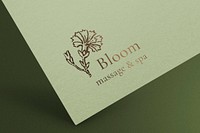 Flower logo mockup, gold paper pressed for wellness business psd