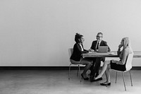 Business people discussing work, greyscale photo