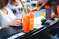 Summer cocktail drinks at the bar. View public domain image source here