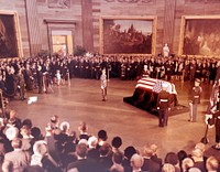 John F. Kennedy Lying in State November 24, 1963President Kennedy casket rests atop the Lincoln catafalque in Capitol Rotunda. Photo by Architect of the Capitol photographers. Original public domain image from Flickr