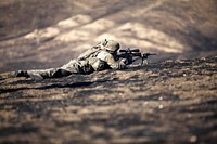 A U.S. Army Ranger with the 2nd Battalion, 75th Ranger Regiment scans his sector during a live fire exercise at Fort Hunter Liggett, Calif., Jan. 23, 2014.