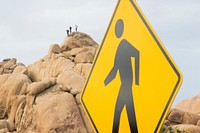 Visitors scrambling on boulders near Jumbo Rocks campground