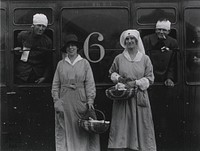 U.S. Army Evacuation Hospital Nos. 6 & 7, Souilly, France, Red Cross workers minister to the wounded. Original public domain image from Flickr