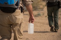 General Park Ranger carrying water in the Desert