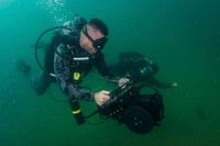 Chief Petty Officer Albert Alejo, assigned to Mobile Diving Salvage Unit (MDSU) 1, and a Royal Australian Navy Diver, practice underwater navigation skills with an underwater navigation and imaging system (UNIS) during Exercise Dugong 2016, in Sydney, Australia, Nov. 10, 2016.