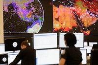 Officers of the U.S. Customs and Border Protection Office of Field Operations conduct global observations of air traffic and trade activities at the new National Targeting Center in Sterling, Va., December 14, 2016.