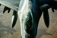 A U.S. Air Force F-16 Fighting Falcon refuels from a 340th Expeditionary Air Refueling Squadron KC-135 Stratotanker over Iraq, Jan. 11, 2017.