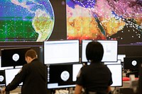 Officers of the U.S. Customs and Border Protection Office of Field Operations conduct global observations of air traffic and trade activities at the new National Targeting Center in Sterling, Va., December 14, 2016.