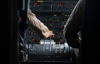 A U.S. Customs and Border Protection Air and Marine Operations air interdiction agent keeps his hands on the controls as he pilots a Bombardier DHC-8 aircraft back to Aguadilla, Puerto Rico, April 2, 2019.