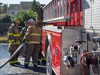 Fire rescue on duty, location unknown, date unknown, Photo by Aaron Hines. Original public domain image from Flickr