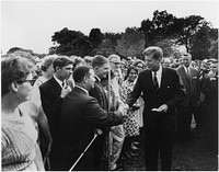 President Kennedy Greets Peace Corps Volunteers on the White House South Lawn. Original public domain image from Flickr