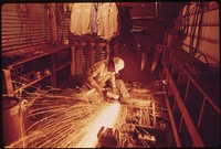 Machinery Being Repaired at a Cedar Mill near Leakey, Texas and San Antonio, 12/1973. Original public domain image from Flickr