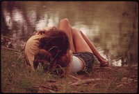 Teenage Couple Embrace on the Bank of the Frio Canyon River near Leakey, Texas, and San Antonio 05/1973. Original public domain image from Flickr