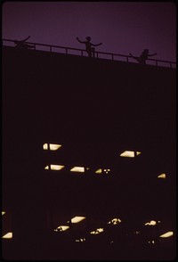 The "Celebrations Group" of Marilyn Woods Rehearses Dance on the Roof of the Fifth Third Bank Building Overlooking Fountain Square. They Are Using the Safety Rail as a Dance Bar 07/1973. Photographer: Hubbard, Tom. Original public domain image from Flickr