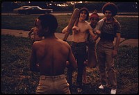 Puerto Rican Boys Playing Softball in Brooklyn's Hiland Park in New York City. The Inner City Today Is an Absolute Contradiction to the Main Stream America of Gas Stations, Expressways, Shopping Centers and Tract Homes.