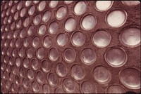 Detail of a Wall in an Experimental Home Built of Aluminum Beer and Soft Drink Cans near Taos, New Mexico. Original public domain image from Flickr