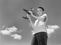 Boy With Flying Model Airplane 1947 Oak Ridge